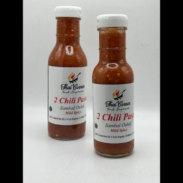 Two bottles of Thai Corner Food Express 2 Chili Paste Sambal Oelek Mild Spicy on a white background.